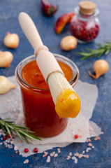 Homemade barbecue sauce in glass