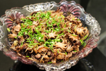 Fried baby octopus with onion