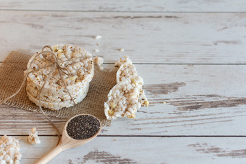 Healthy puffed rice waffles with chia seeds for diet. Rice cakes as a healthy eating concept.