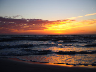 Obraz premium Evening Waves and Rolling Tide on Gulf of Mexico Coast