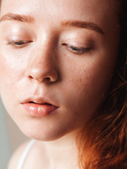 Fototapeta premium the face of a teenager after washing - wet skin closeup. Care concept