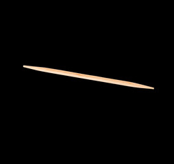 Wood toothpick on black solid isolated background