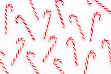 Christmas candy cane pattern on white background top-down