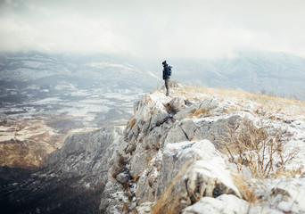 Hiker standing at mountain viewpoint, travel lifestyle hiking wanderlust concept