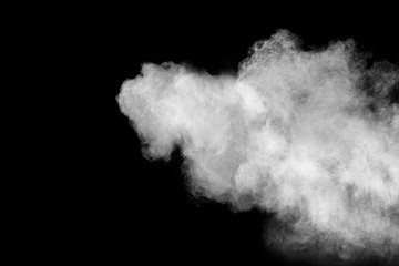 White powder explosion isolated on black background.