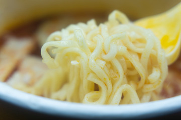 Noodle cup with a Plastic Fork on close up photography 