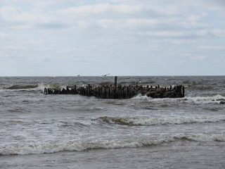 Fototapeta na wymiar Stone pier in sea