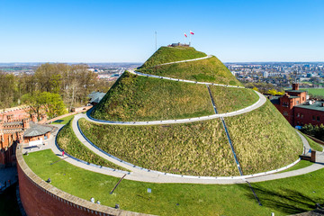 Kosciuszko Mound (Kopiec Kościuszki). Krakow landmark, Poland. Erected in 1823 to commemorate Tadedeusz Kosciuszko. Surrounded by a citadel, erected by Austrian Administration about 1850. Aerial viewd - obrazy, fototapety, plakaty