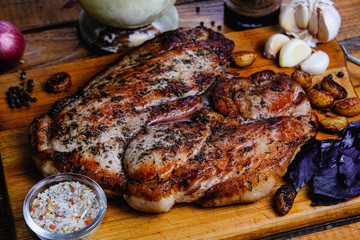 roasted ham composition on a wooden background