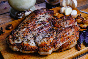 roasted ham composition on a wooden background