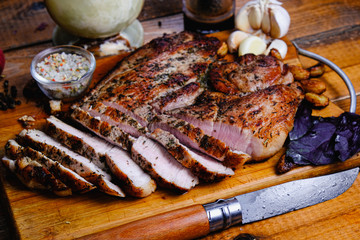roasted ham composition on a wooden background