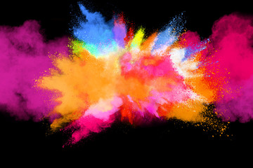 Multicolor powder explosion isolated on black background.