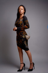 Beautiful African American woman, attractive young confident woman posing and looking at the camera