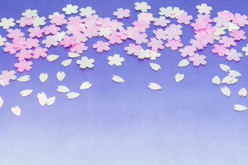 和紙で表現した桜吹雪（背景グラデーション・花吹雪・サクラ・さくら・花びら・ハート形・４月・春）
