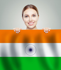 India concept. Happy cute woman with India flag background. Trav