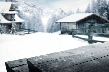 Wooden table of free space and winter rural background. 