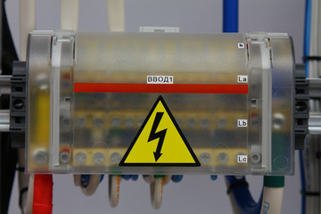 Installation of an electrical panel with difautomatics and automatic protection devices on a metal frame with flexible wires.cross-modules for connecting wires