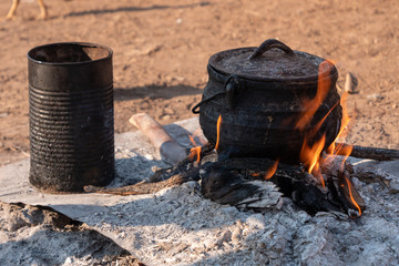 Himba Fireplace - Black Cauldron and Tin on Camp Fire