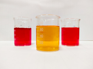 TWO PHASES OF LIQUID IN BEAKER