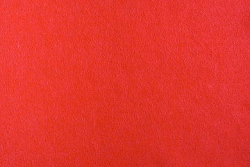 Abstract background with red felt texture, top view