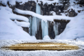 Table background of free space for your decoration and snow with ice landscape 