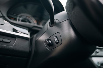 Obraz na płótnie Canvas Steering wheel warmer controller at the car