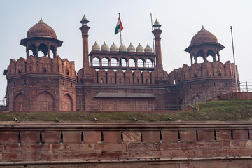 Striking view of the outside of Red Fort in Delhi India, with the India flag waving