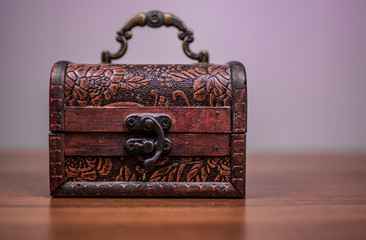  brown wooden box in vintage style on a gray background