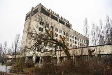 Fototapeta na wymiar Hotel Polissya Polissia in Prypiat city, abandoned ghost town. Chornobyl exclusion zone. Ukraine, December 2019
