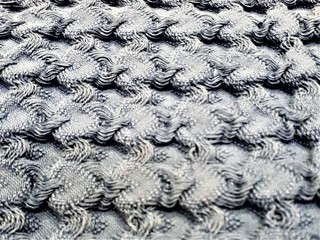  Close-up of dense fabric with abstract spots, patterns and blur. Design for outerwear, curtains, bedspreads, wallpaper.