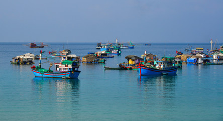 Fototapeta na wymiar Fishing boats on the blue sea