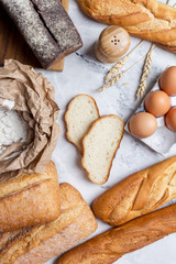 Ingredients for baking bread on white background