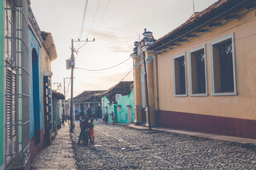 Colorful houses and vintage cars in Trinidad, Cuba. Unesco World Heritage Site.