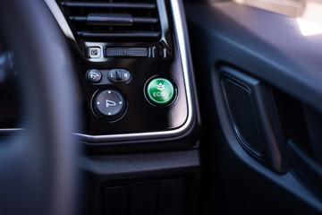 Obraz na płótnie Canvas Green eco friendly car button , save energy