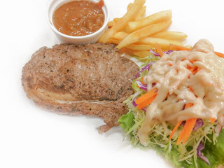 Steak and vegetable salad on the plate