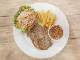 Steak and vegetable salad on the plate
