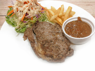 Steak and vegetable salad on the plate