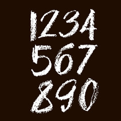 set of calligraphic pastel or chalk numbers. ABC for your design, pastel lettering on a black background