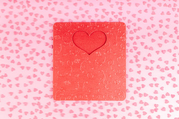 Red Valentine Card with Heart Decoration Small Hearts on a Pink Background. Concept of Celebration Valentines Day