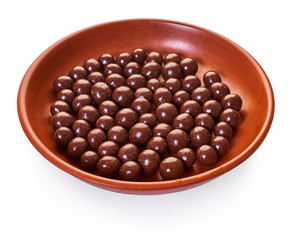 round chocolate candies in a plate