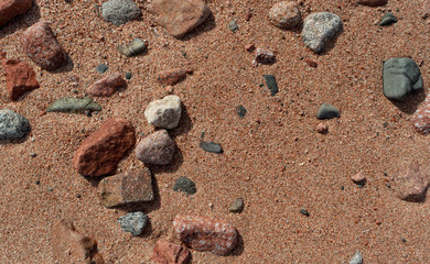 Red Sand and Stones of the red Sea Coast, Natural Texture Background