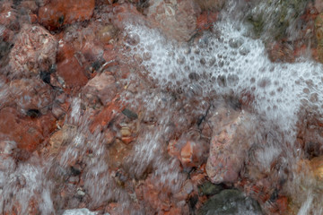 Red Sand and Stones of the red Sea Coast, Natural Texture Background