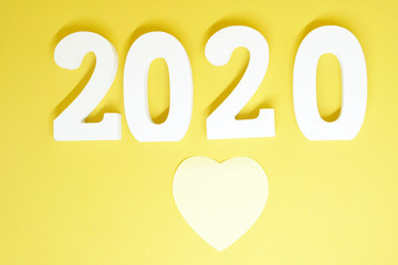 Single or Lonely Yellow Heart -  y ellow Heart Paper Object on yellow  Background - Valentine Day 2020 - Lover Concept  with Copy space                                                          