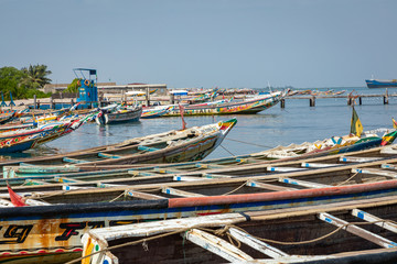 Fototapeta na wymiar Traditional painted wooden fishing boat in Djiffer, Senegal. West Africa.