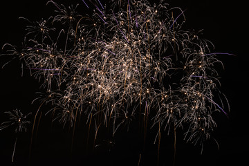2020 New Year colorful fireworks exploding on the sky above Lacul Morii Lake, Bucharest, Romania -...