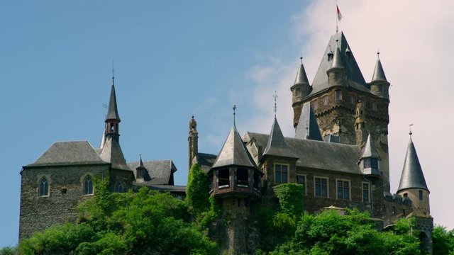 Old town with the Imperial Castle on the Moselle, beautiful medieval Cochem town with half-timbered houses and vineyards. Cochem, Rhineland-Palatinate, Germany, Europe, July 2019