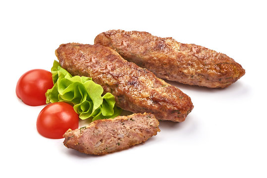 Fried american breakfast sausages, isolated on white background