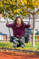 Little girl posing in park