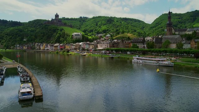 Old town with the Imperial Castle on the Moselle, beautiful medieval Cochem town with half-timbered houses and vineyards. Cochem, Rhineland-Palatinate, Germany, Europe, July 2019