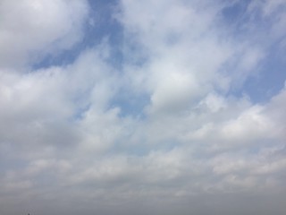 Naklejka na ściany i meble beautiful cloudy sky on a sunny weather day